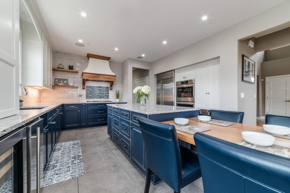 Ovation Interior Design won Best Kitchen Renovation Under $50,000 for their transitional kitchen custom home remodeling project.