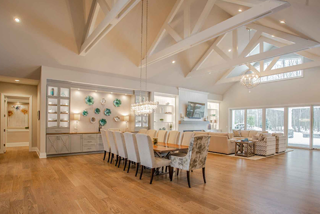 Open floor plan of living & dining room in a completed Otero Home