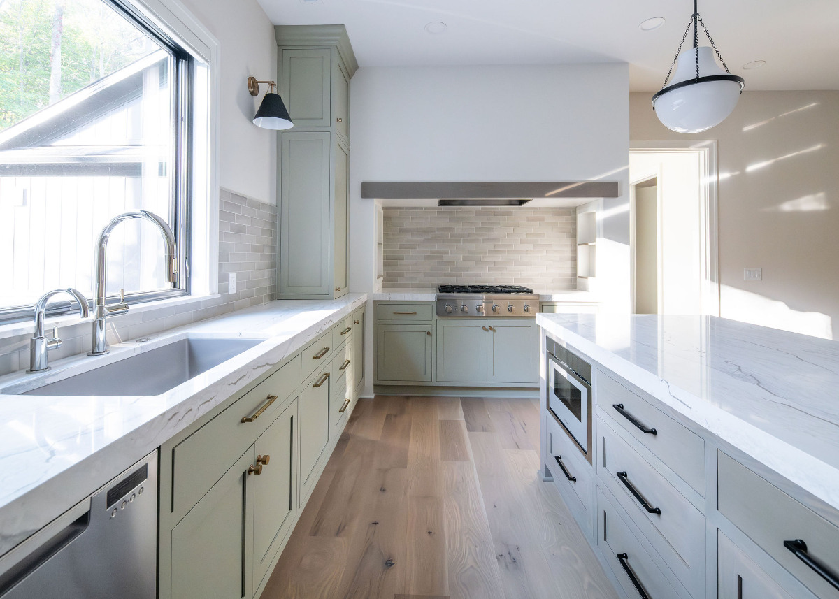 a kitchen with plenty of drawers and storage designed by Otero Homes