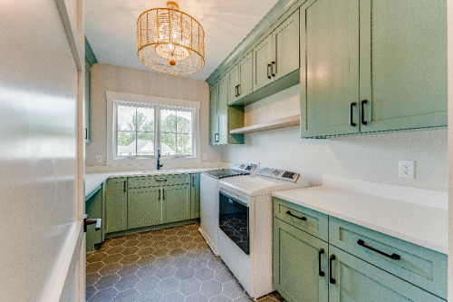 Custom Laundry Room by Otero Signature Homes